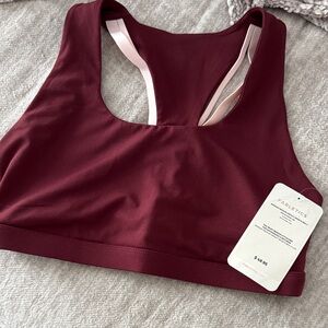Fabletics Boost Medium Impact Sports Bra, Burgundy